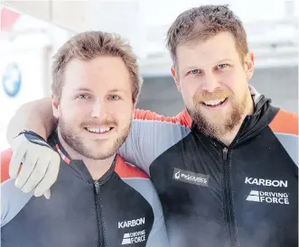  ?? JOHANN GRODER/GETTY IMAGES ?? Justin Kripps, left, and Jesse Lumsden celebrate their silver medal in the World Cup two-man bobsled event in Igls, Austria, on Saturday. They also won silver with a four-man crew Sunday.