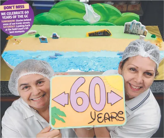  ?? Picture: GLENN HAMPSON ?? Goldsteins cake decorators Hazel Carpenter and Janette Crane put the final touches to the Gold Coast's 60th birthday cake.