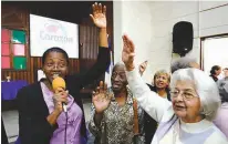  ?? Associated Press ?? n People sing on March 19 as they attend Sunday worship at the William Carey Baptist Church in Havana.