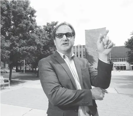  ?? NICK BRANCACCIO ?? City of Windsor planner Thom Hunt talks Thursday about plans for a civic square and esplanade that will be the final phase of the $43-million city hall project. A long-standing vision of creating a vista from city hall down to the river is taking shape, officials say.