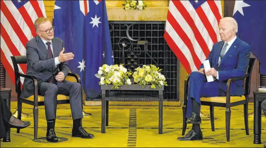  ?? Evan Vucci The Associated Press ?? President Joe Biden, right, meets with Australian Prime Minister Anthony Albanese at Kantei Palace on Tuesday in Tokyo.