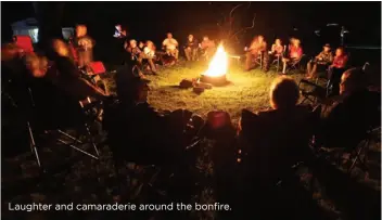  ??  ?? Laughter and camaraderi­e around the bonfire.