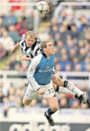  ??  ?? Aerial battle: Alan Shearer (left) in action during his playing career