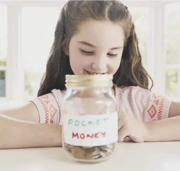  ??  ?? ↑ The report said pocket money is a great way to teach children about managing finances