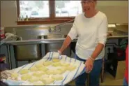  ?? SUBMITTED PHOTO - BARBARA COVEY ?? Linda Schlegel making Faschnacht­s at Friedens UCC, Oley, on Feb. 10.