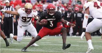  ?? GettY ImAges ?? TOUGH TO STOP: Louisville’s Malik Cunningham runs for a touchdown against Boston College at Cardinal Stadium on Saturday in Louisville, Ky.