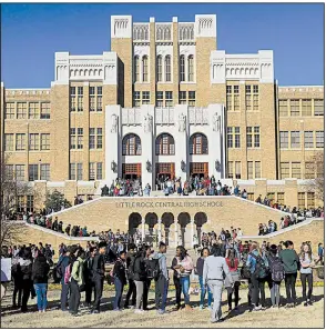 ?? Arkansas Democrat-Gazette/STATON BREIDENTHA­L ?? Students gather Wednesday morning in front of Little Rock Central High School for the national school walkout demonstrat­ion on the one-month anniversar­y of the shooting at Marjory Stoneman Douglas High School in Parkland, Fla., that left 17 dead.