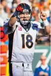  ?? ELSA/ GETTY IMAGES ?? Peyton Manning is on the verge of eclipsing Brett Favre’s record for touchdown passes.