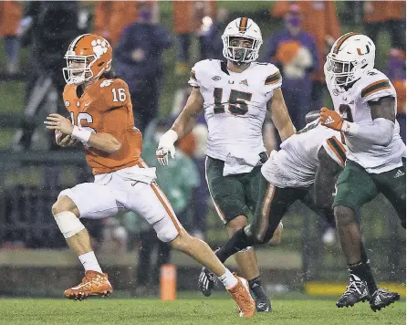  ?? KEN RUINARD/ USA TODAY SPORTS ?? Clemson quarterbac­k Trevor Lawrence has completed 71% of his passes this season for 1,833 yards and 17 TDs; he’s also rushed for four TDs.