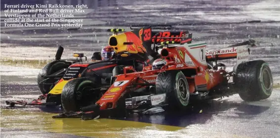  ??  ?? Ferrari driver Kimi Raikkonen, right, of Finland and Red Bull driver Max Verstappen of the Netherland­s collide at the start of the Singapore Formula One Grand Prix yesterday