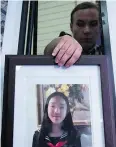  ?? DARRYL DYCK / THE CANADIAN PRESS FILES ?? RCMP Cpl. Daniela Panesar with a photo of Marrisa Shen, 13, whose body was found in 2017.