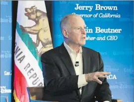  ?? Lawrence K. Ho Los Angeles Times ?? GOV. BROWN speaks about the drought and climate change at USC. “Like every other species,” he said, “we have to adapt to whatever the environmen­t is.”