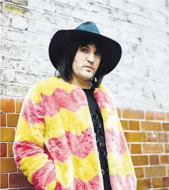  ?? Vicky Grout / New York Times ?? Noel Fielding, host of “The Great British Baking Show,” outside the Cartoon Museum in London. The comedian became an indie darling with “The Mighty Boosh.” Fronting Britain’s favorite reality show has taken some adjustment.