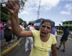  ?? /EFE ?? Nicaragua nfrenta la crisis más sangrienta desde la década de 1980; en la imagen una partidaria del régimen.