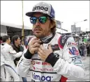  ?? JOHN RAOUX / AP ?? Fernando Alonso, a two-time Formula One champ, is one of the drivers taking more initiative in reaching out to draw fans back to auto racing.