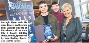  ?? (Pic: Siobhán Russell) ?? Darragh Flynn with his mam Aideen and brother Eoin. Darragh was one of the winners of the Cork City & County All-Star Youth Awards, sponsored by John Buckley Sports.