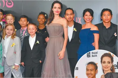  ?? FOTOS: AFP ?? JUNTOS. Jolie, sus hijos y el elenco de su film. Con Maddox.