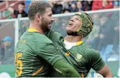  ?? Picture: GALLO IMAGES/ROBERTO BREGANI ?? THINGS LOOKING UP: SA’S Kurt-lee Arendse celebrates with Willie le Roux after scoring a try during the Test against Italy at Stadio Luigi Ferraris in Genoa on Saturday.