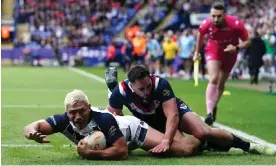  ?? Photograph: Martin Rickett/PA ?? England’s Ryan Hall touches down for his second try in 11 minutes against France.