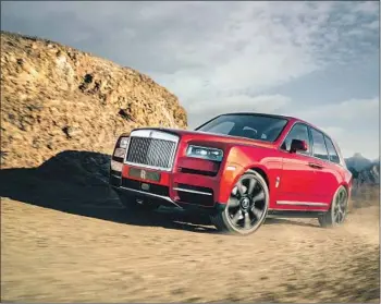  ?? Photograph­s by Rolls-Royce Motor Cars ?? NEARLY 6,000 POUNDS, the V-12 Cullinan averages 14 mpg and includes a $2,600 “gas guzzler” fee in its $325,000 base price. The plush, powerful SUV is so quiet that it could be mistaken for an electric vehicle.