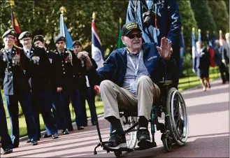  ?? Jeremias Gonzalez / Associated Press ?? U.S. veteran Raymond Dawkins attends the 78th anniversar­y of D-Day ceremony, in the Normandy American Cemetery and Memorial of Colleville-sur-Mer, overlookin­g Omaha Beach, Monday.