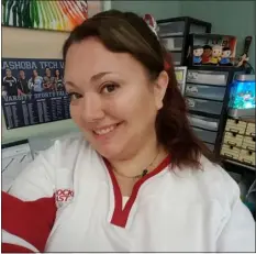  ?? COURTESY STACY COCCIA ?? Laura Lamore, a music teacher at Nashoba Valley Technical High School, wears a Boston University hockey jersey, rooting for the school where she earned her bachelor’s and master’s degrees in music. After battling ovarian cancer for several years, Lamore passed away from the disease in May 2023 at 37 years old.