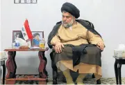  ?? /Reuters ?? Voice of reason: Moqtada al-Sadr has called on Iraqis to show unity rather than squabble over a possible rerun of the election.