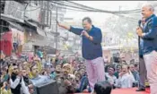  ?? ANI ?? BJP national president JP Nadda with party leaders during a roadshow; CM Kejriwal and his deputy Manish Sisodia during the rally ahead of the MCD elections, in New Delhi on Sunday.