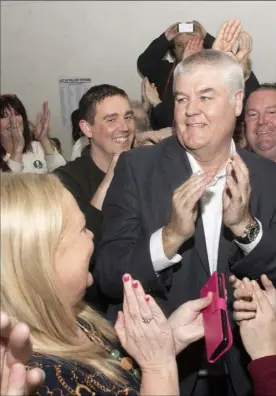  ??  ?? Sinn Féin’s Johnny Mythen celebrates after a landslide victory in February.