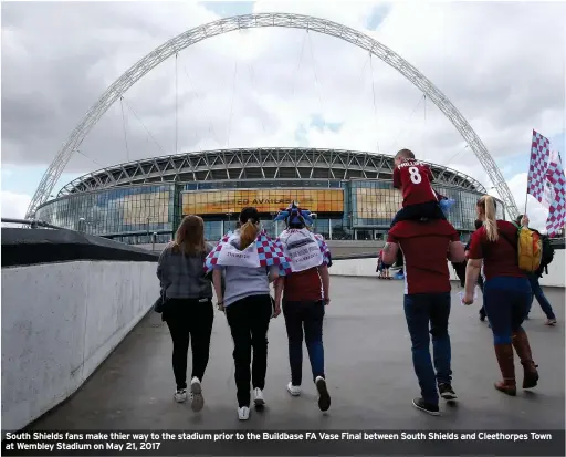  ??  ?? South Shields fans make thier way to the stadium prior to the Buildbase FA Vase Final between South Shields and Cleethorpe­s Town at Wembley Stadium on May 21, 2017