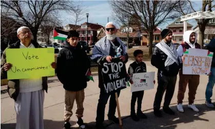  ?? Photograph: Rebecca Cook/Reuters ?? ‘Uncommitte­d’ supporters hold a rally ahead of Michigan's Democratic presidenti­al primary election in Hamtramck on Sunday.