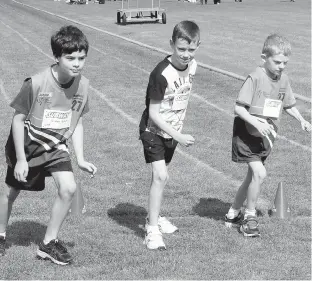  ??  ?? Trsitan Silver, Tyler Swain and Aaron Boughey get set to start their race