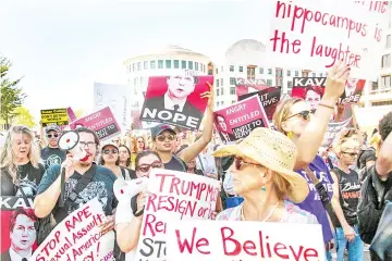  ??  ?? Demonstrat­ors stage protest against Kavanaugh near the US Capitol in Washington, DC. — AFP photo