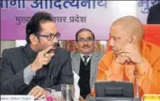  ?? PTI ?? Uttar Pradesh chief minister Yogi Adityanath (right) with Union minister for minority affairs Mukhtar Abbas Naqvi at an event in Lucknow on Thursday.