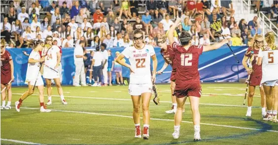  ?? ANDREW THEODORAKI­S/NEW YORK DAILY NEWS ?? Maryland’s Grace Griffin (22) reacts after a Boston College goal. Jen Giles had three goals and three assists, Taylor Hensh added three goals and Megan Taylor had 13 saves for the Terps.