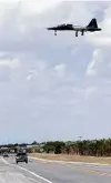  ??  ?? An Air Force T-38 Talon flies over U.S. 90 during training flights at Laughlin AFB near Del Rio.