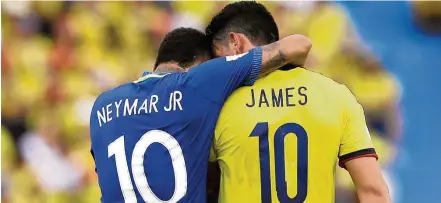  ?? FERNANDO VERGARA/AP ?? Craques. Neymar e James Rodríguez se abraçam após o final da partida; clima entre atletas e torcida foi de cordialida­de