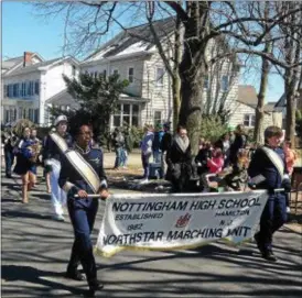  ??  ?? The Nottingham High School marching band performs during the annual Hamilton Saint Patrick’s Day Parade on Saturday.