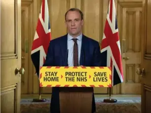  ?? (PA) ?? Dominic Raab fi ll ing in for Boris Johnson at a Covid media briefing in 2020