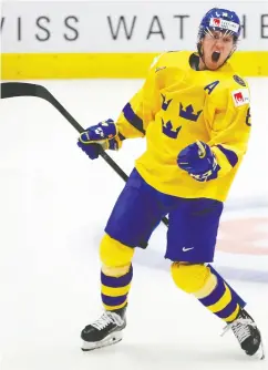  ?? Petr Davi d Josek / the asociat ed press ?? Leafs prospect Rasmus Sandin celebrates after scoring
for Sweden in the World Juniors semifinal Saturday.