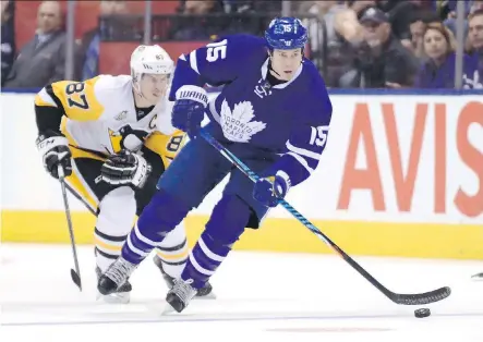  ?? JON BLACKER/THE CANADIAN PRESS ?? Toronto Maple Leafs’ Matt Martin, right, breaks out of his zone during recent NHL action. Martin’s physicalit­y and leadership skills have proven invaluable to the Leafs this season.