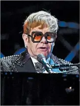  ?? ANGELA WEISS/GETTY-AFP ?? Elton John performs Jan. 30 at a concert that will air April 10. Two star-sung cover albums are on the way.