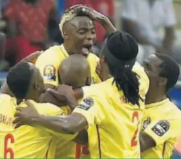  ??  ?? Kudakwashe Mahachi is mobbed by Warriors’ players after scoring a goal against Algeria in their opening match of the Africa Cup of Nations in Gabon last week