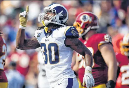  ??  ?? Los Angeles Rams running back Todd Gurley celebrates after scoring against the Washington Redskins during an NFL football game Sunday in Los Angeles.