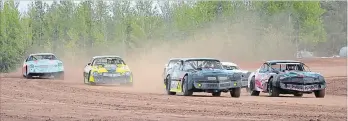  ?? BERND FRANKE, THE ST. CATHARINES STANDARD ?? Eight-cylinder stock cars racing on the dirt in the Thunder Stock division at New Humberston­e Speedway in Port Colborne. The speedway’s season officially begins on May 19.