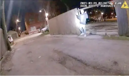  ?? IMAGE FROM COPA VIDEO ?? A still frame from video recorded by a Chicago police officer’s body-worn camera shows Adam Toledo just before he was shot by the officer.