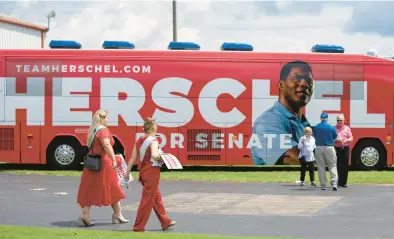  ?? HAIYUN JIANG/THE NEW YORK TIMES ?? Republican Herschel Walker is mired in controvers­y as he looks to unseat Georgia Sen. Raphael Warnock.