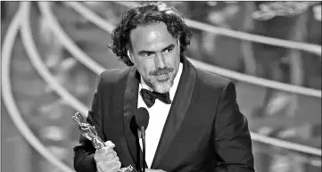  ??  ?? Inarritu wins the Best Directing Oscar award for ‘The Revenant’ in 2016. — File photo