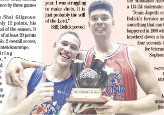  ?? ?? PHOTOGRAPH COURTESY OF PBA ROBERT BOLICK (left) shares the MVP honors with Japeth aguilar after helping team Mark forge a 140-140 draw with team Japeth in the Pba all-Star game.