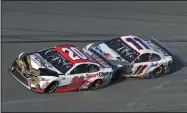  ?? DARRYL GRAHAM — THE ASSOCIATED PRESS ?? Erik Jones (20) gets a push from Denny Hamlin to help him pull away on the final lap to win the NASCAR Busch Clash Feb. 9, 2020, in Daytona Beach, Fla.